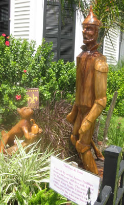 The Tin Man and Toto carved from salt damaged tree 